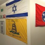 Outside of a UKIP MEP's office in the European Parliament, with flags of Israel, Tenessee and Gadsden tacked onto the wall.