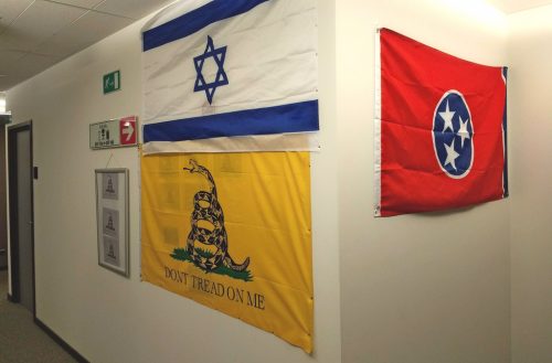 Outside of a UKIP MEP's office in the European Parliament, with flags of Israel, Tenessee and Gadsden tacked onto the wall.