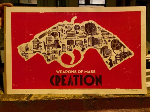 Outline of gun filled with machines early twentieth-century machines on a read background with the text Weapons of Mass Creation below